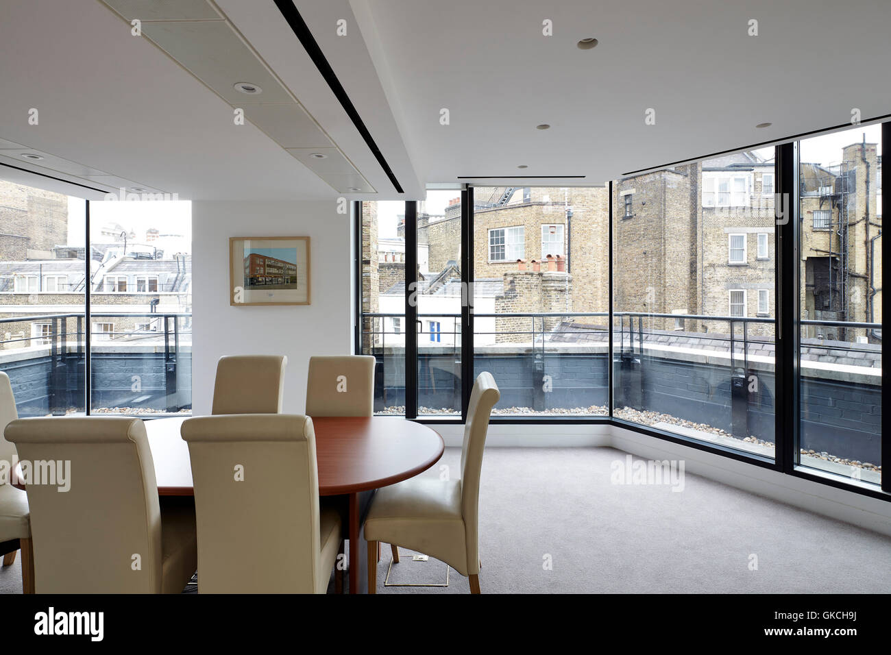 Board room, meeting room top floor. 54 Brooks Mews, London, United Kingdom. Architect: Stiff + Trevillion Architects, 2016. Stock Photo