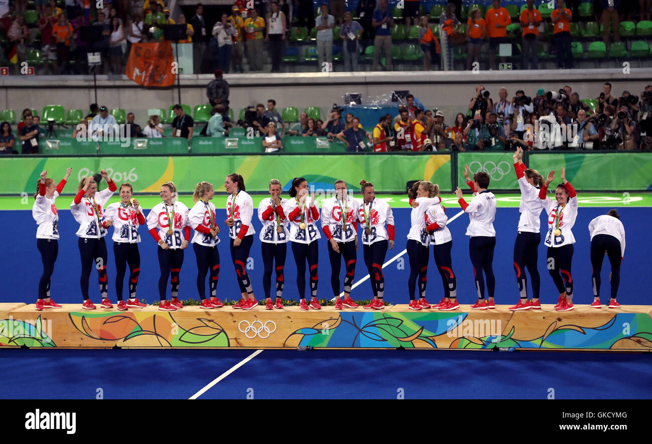 Great Britain on the podium with their gold medals after winning the gold medal match at the Olympic Hockey Centre on the fourteenth day of the Rio Olympic Games, Brazil. Stock Photo
