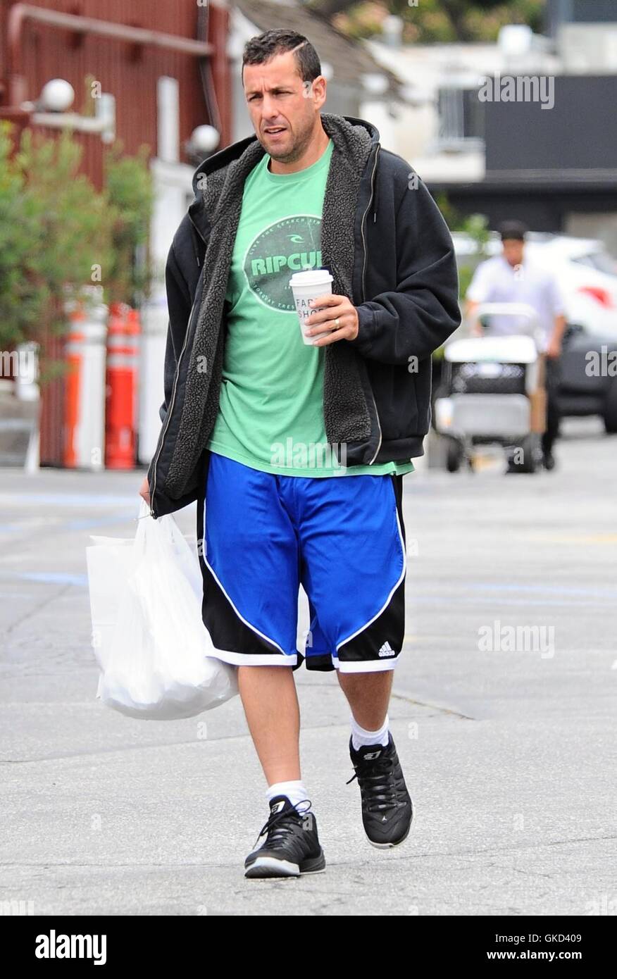 Adam Sandler and his wife Jackie Sandler out in Brentwood, California