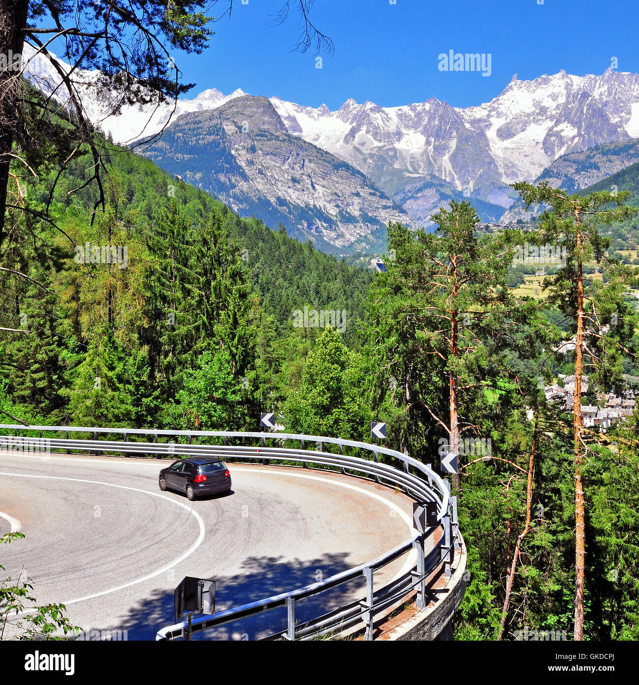 Car on the winding road in mountains, italian Alps Stock Photo - Alamy