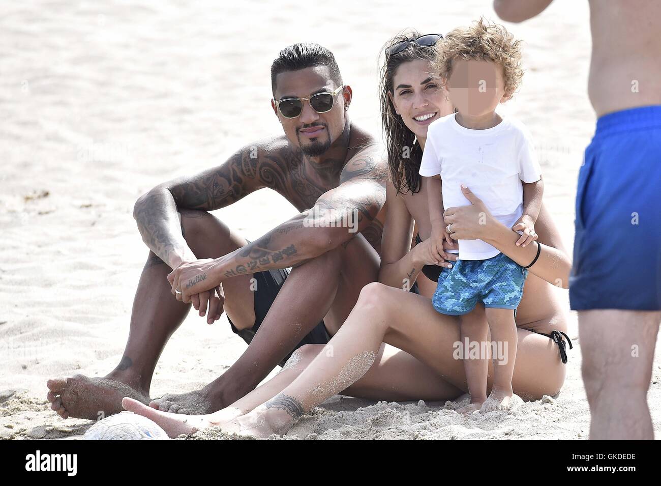 Kevin-Prince Boateng with his wife Melissa Satta and their son Maddox  enjoying a day on the beach in Porto Cervo Featuring: Kevin-Prince Boateng, Melissa  Satta, Maddox Prince Boateng Where: Porto Cervo, Italy
