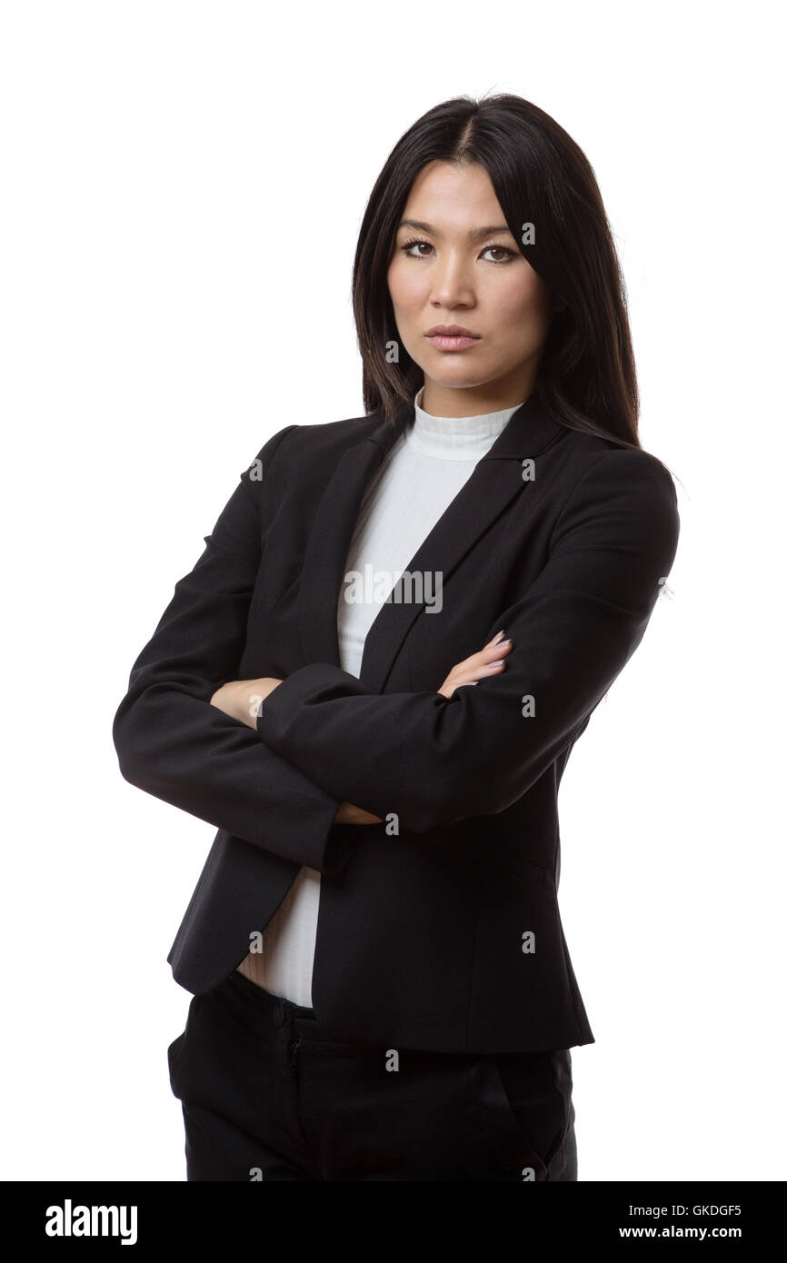 serious looking business woman with her arms crossed Stock Photo - Alamy
