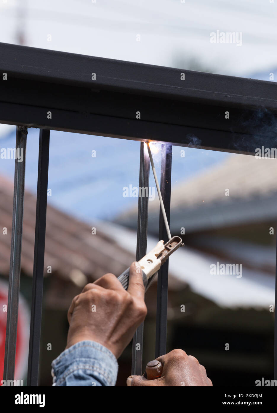 worker welding at manufacturing , welding door frames Stock Photo Alamy