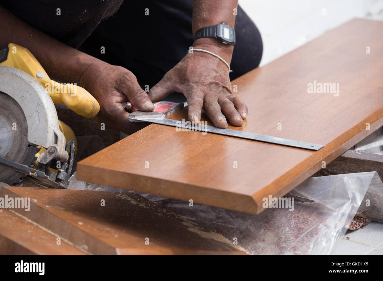 carpenter use ruler to measuring wood board Stock Photo Alamy
