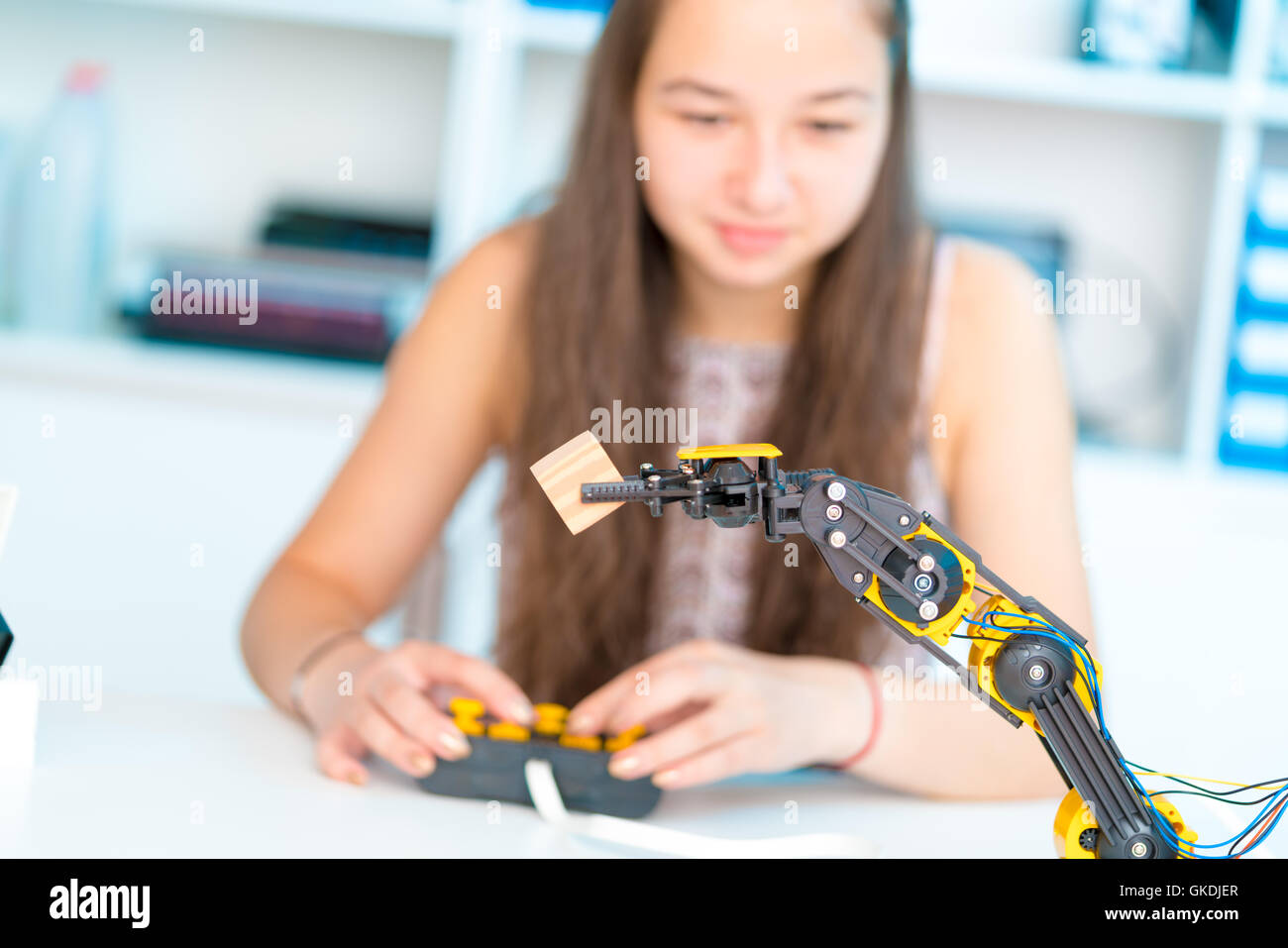 Teen girl in robotics laboratory Stock Photo
