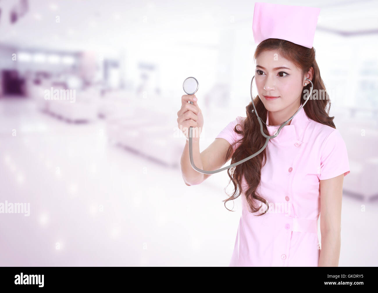 female nurse with stethoscope in hospital background Stock Photo - Alamy