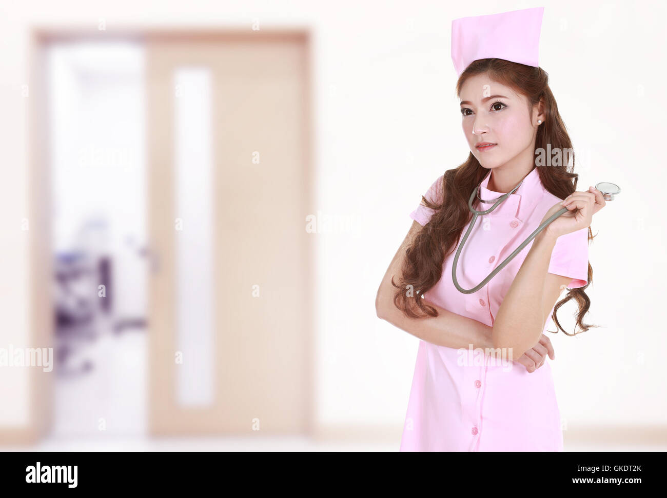 female nurse with stethoscope in hospital background Stock Photo - Alamy
