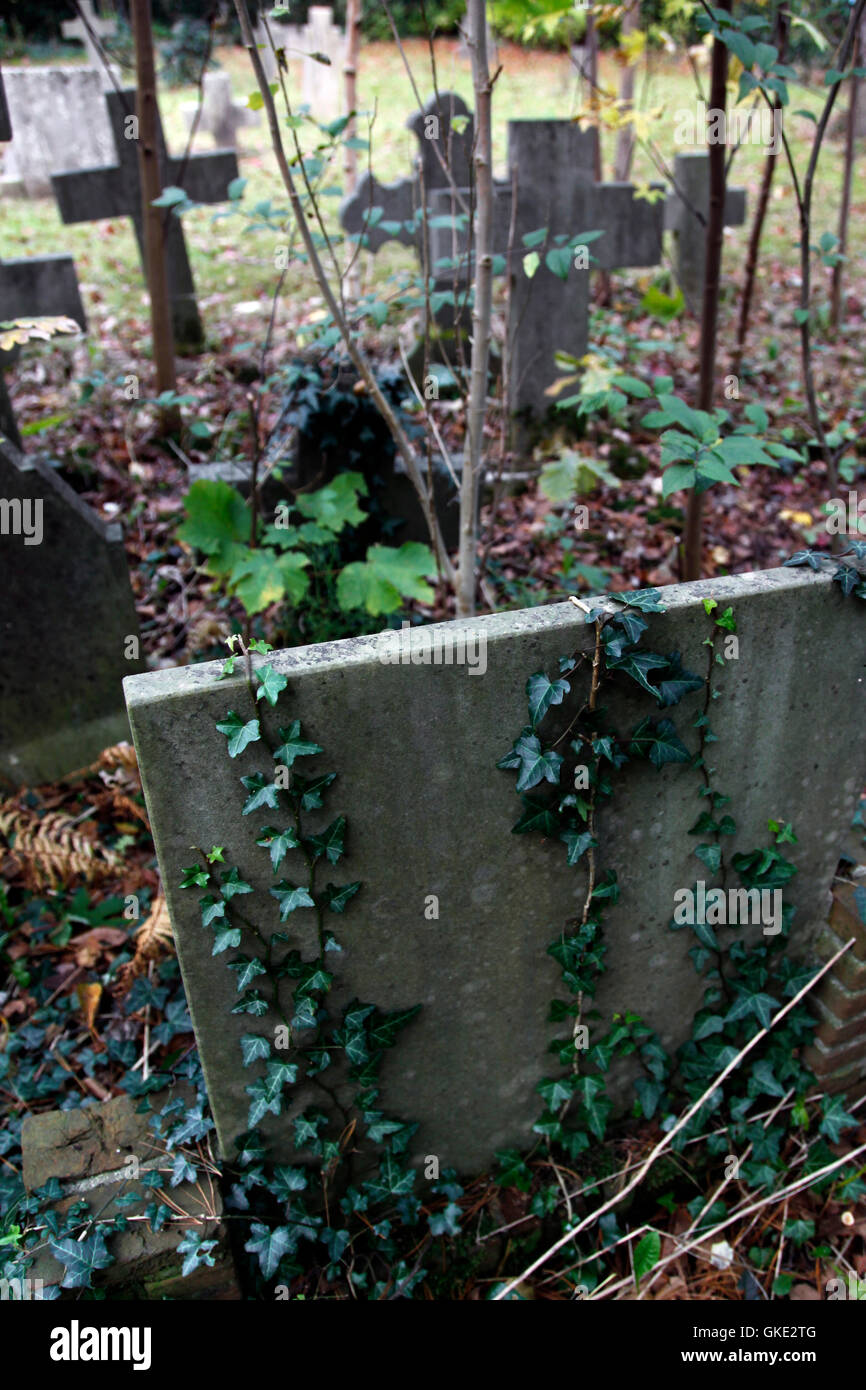 tombstones on an old catholic cemetery Stock Photo