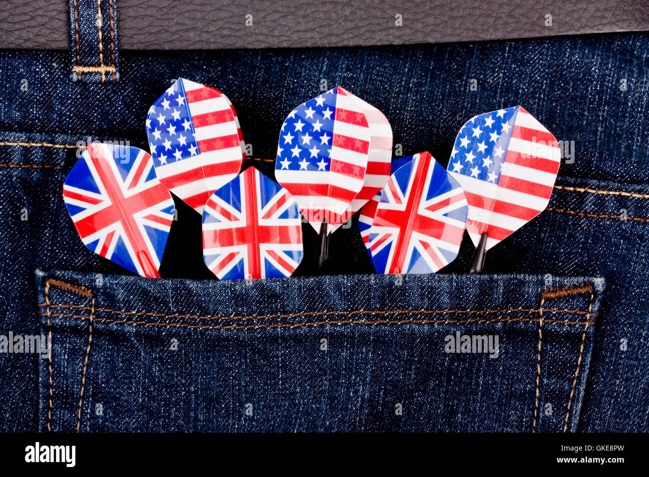 USA and UK darts in jeans pocket Stock Photo Alamy