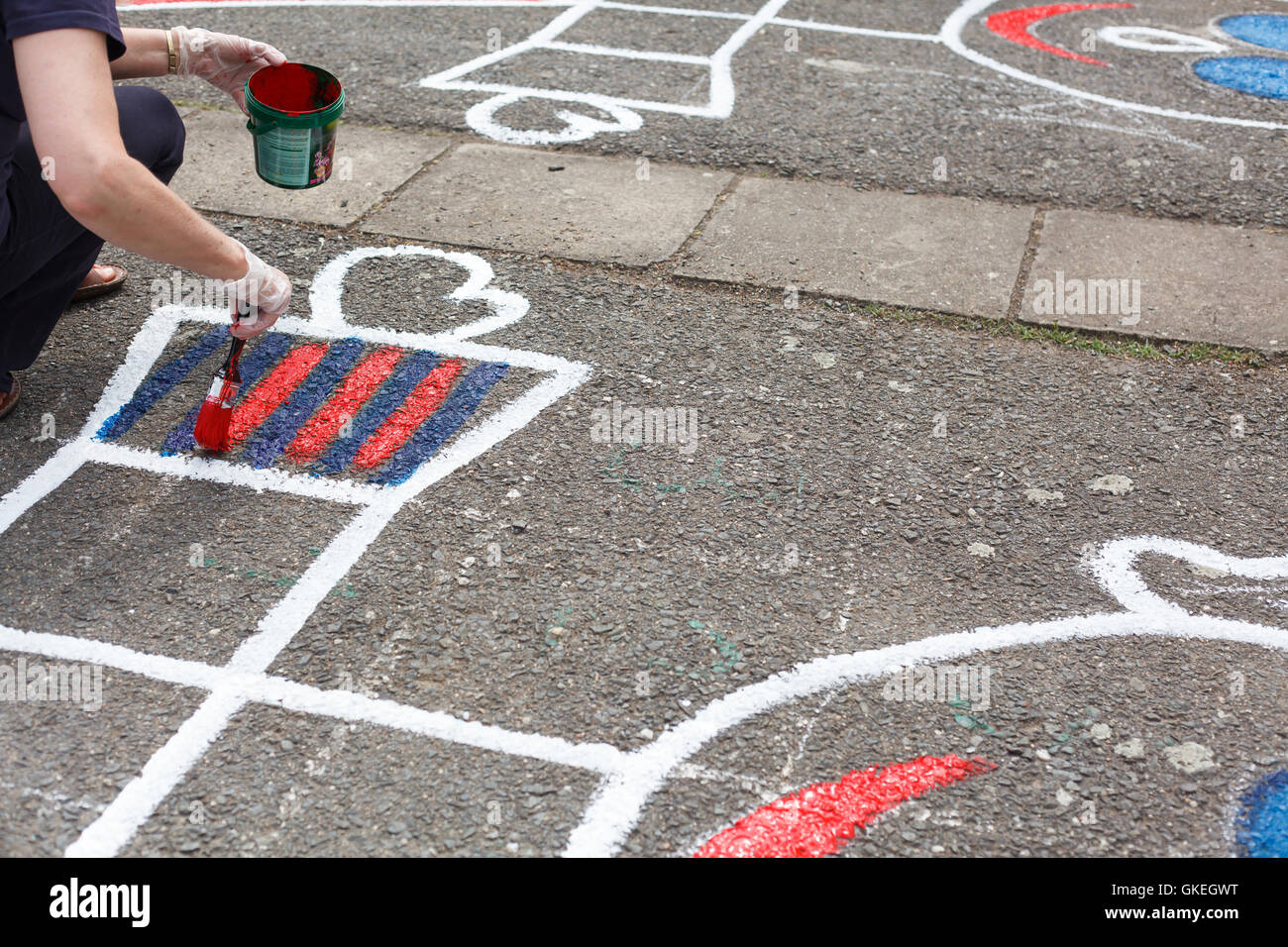 painting playground. Creating attraction in the playground. Handmade