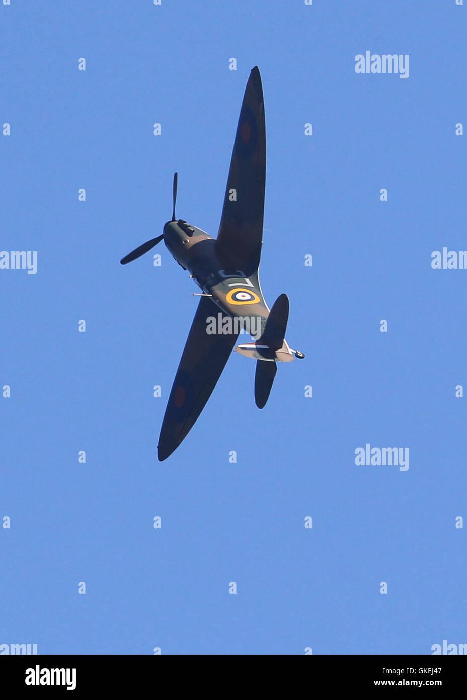 A lone spitfire climbs above the beach of 'Dunkirk' in the exact spot