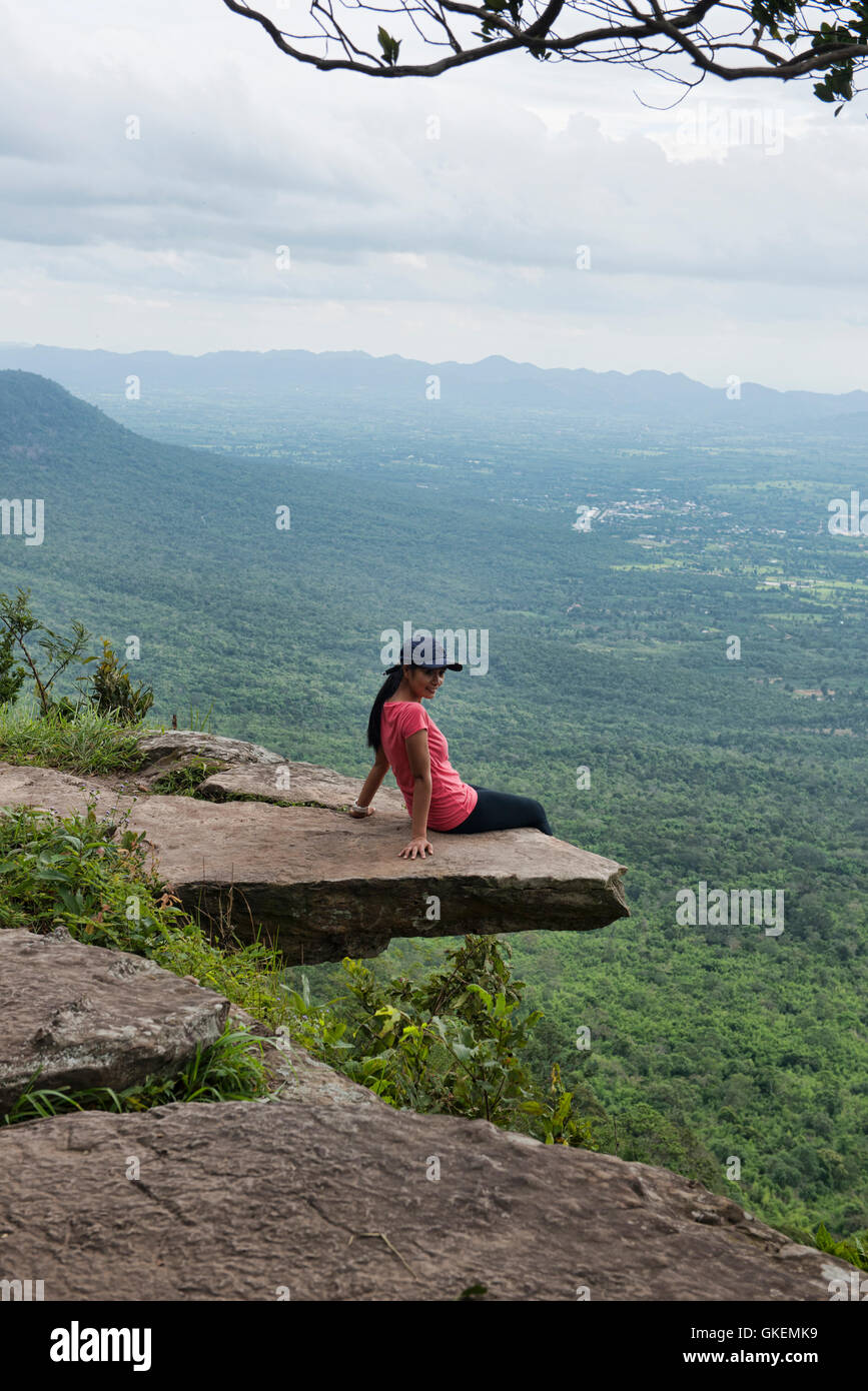 Sitting on the edge of Pha Ham Hod, which translates to 'shrunken balls cliff!' Sai Thong National Park, Chaiyaphum, Thailand Stock Photo