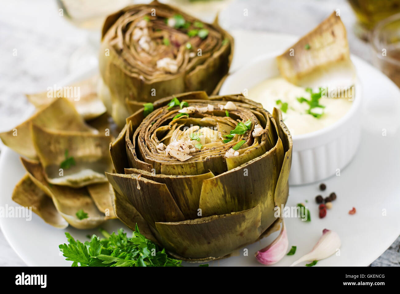 Baked artichokes cooked with garlic sauce, mustard and parsley Stock