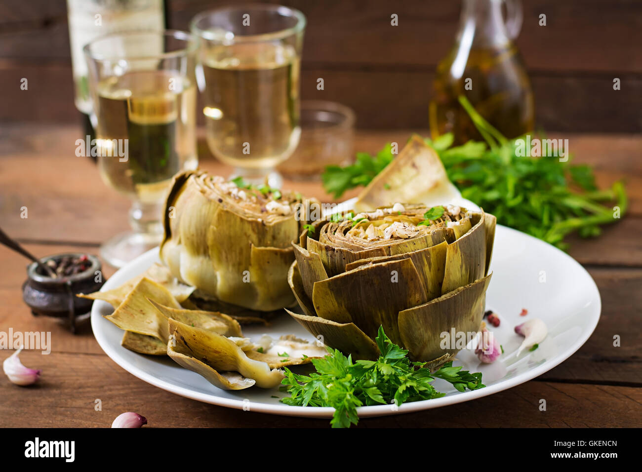 Baked artichokes cooked with garlic sauce, mustard and parsley Stock
