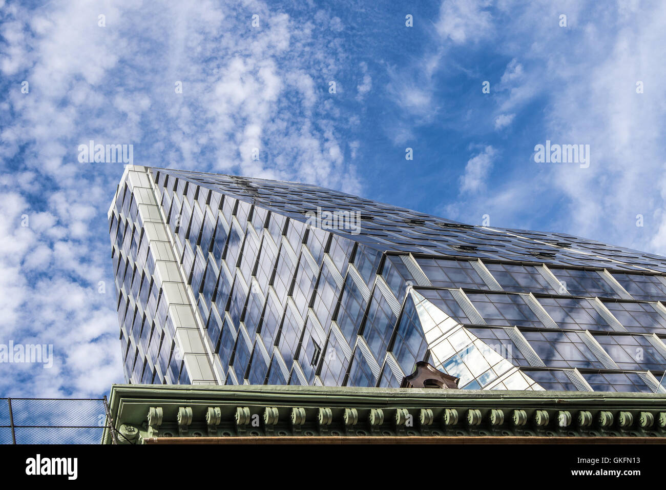 A high rise building with glass exterior Stock Photo