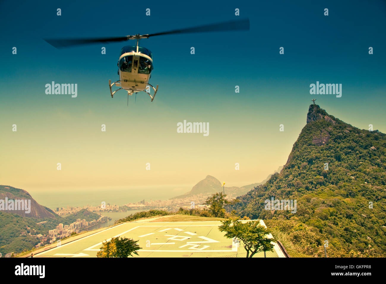 Helicopter in air in front of Corcovado Rio De Janeiro Brazil Stock Photo
