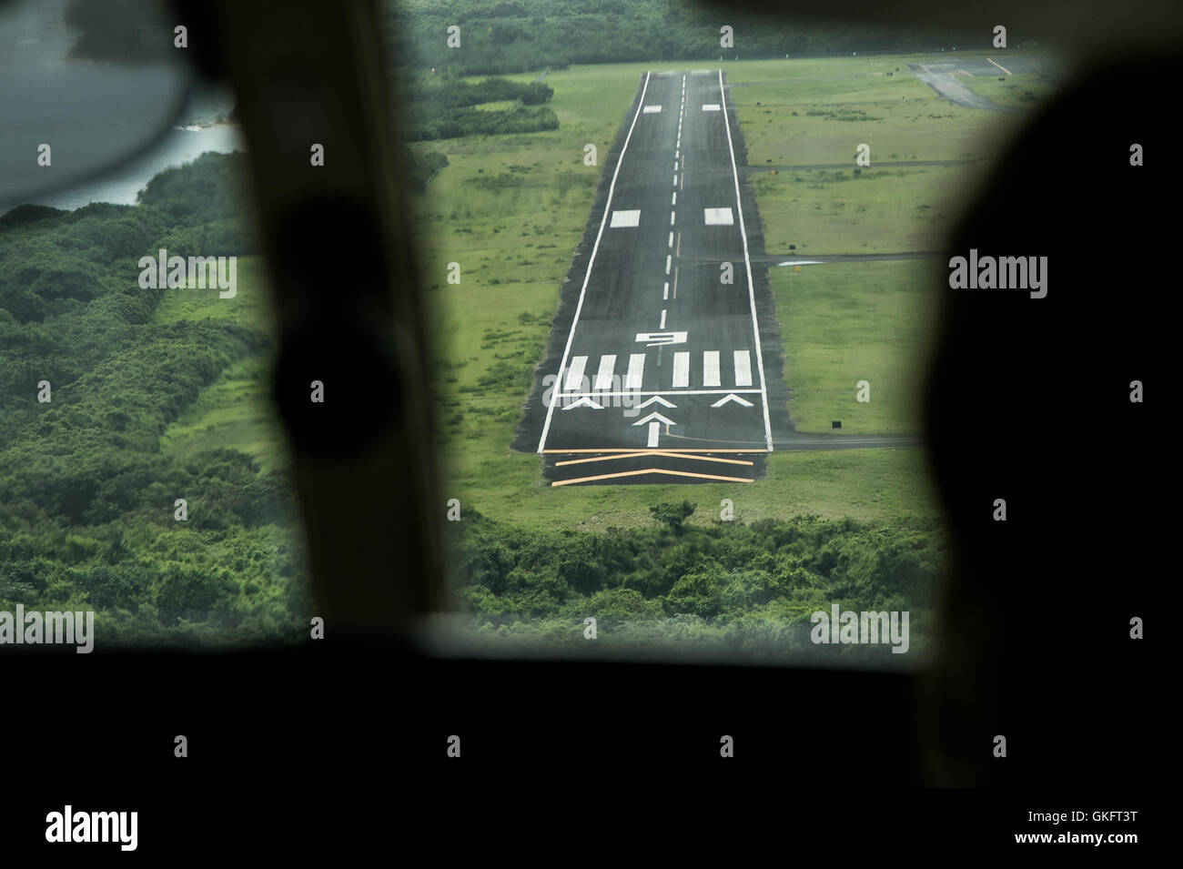 Landing strip as seen from the cabin of a small plane. Stock Photo