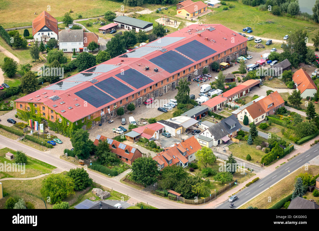 Aerial view, barn Bollewick Landhotel Zur Scheune, Long Barn, largest stone barn in Germany, Bollewick,Mecklenburg Lake District Stock Photo