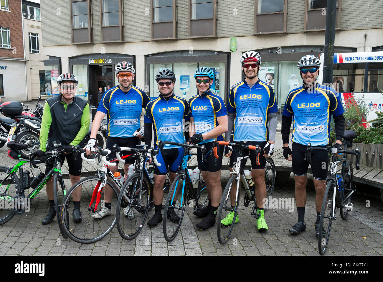 Truro, Cornwall. 20th August, 2016.  Six cyclists from Bristol take a well earned break on the first day of their marathon bike ride from Lands End to John O’Groats. Photographer: Gordon Scammell/Alamy Live News. Stock Photo