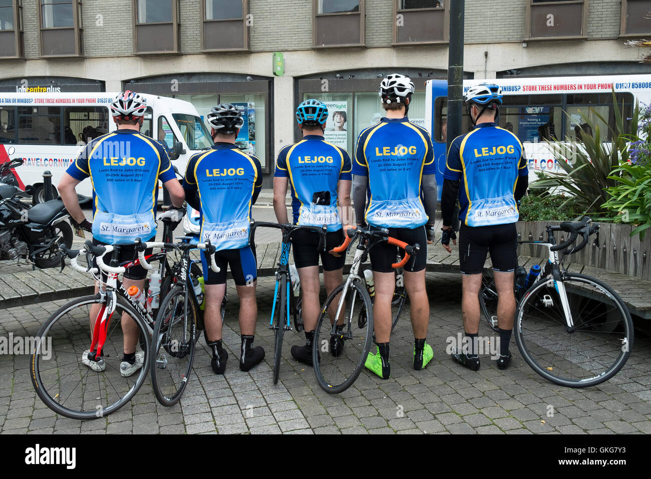 Truro, Cornwall. 20th August, 2016.  Five cyclists from Bristol take a well earned break on the first day of their marathon bike ride from Lands End to John O’Groats. Photographer: Gordon Scammell/Alamy Live News. Stock Photo