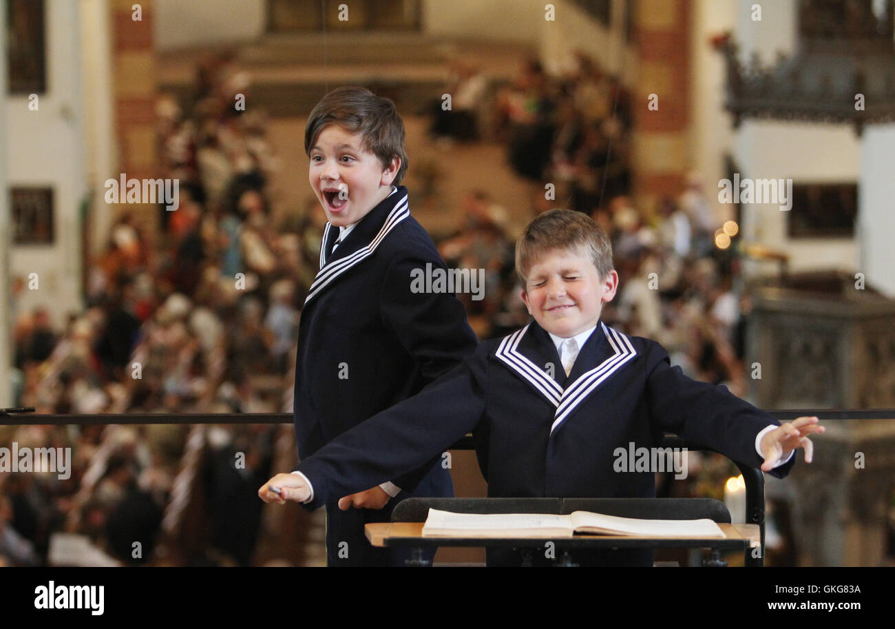 Leipzig, Germany. 20th Aug, 2016. A singer of the Thomaner choir at the Thomas church in Leipzig, Germany, 20 August 2016. Gotthold Schwarz was officially installed during a ceremonial act at the city hall. PHOTO: SEBASTIAN WILLNOW/dpa/Alamy Live News Stock Photo