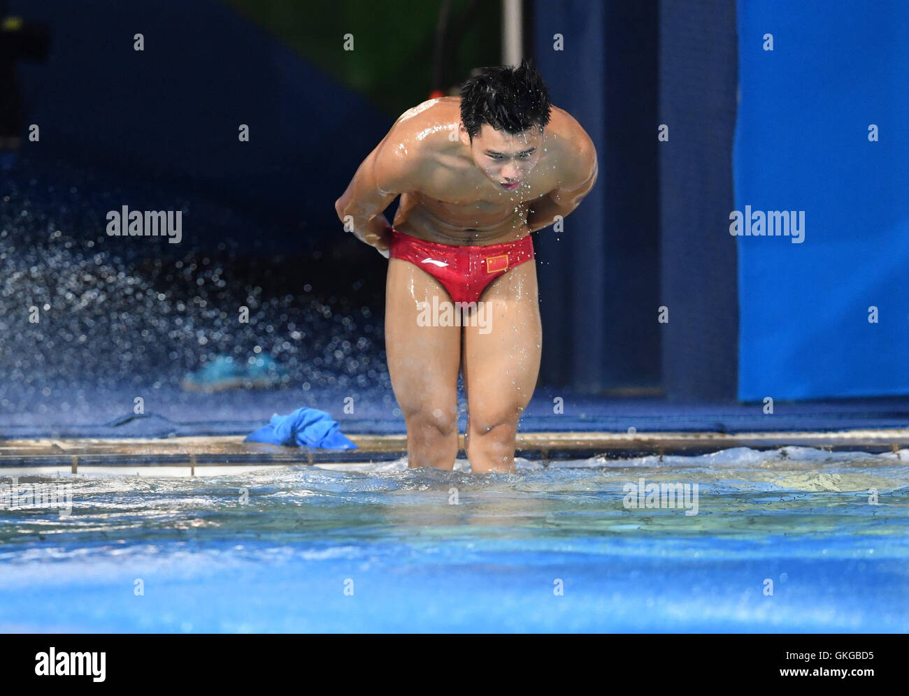 Rio de Janeiro, Brazil. 20th Aug, 2016. Gold medalist Chen Aisen of China reacts after his dive during the Men's 10m Platform Final of the Diving event during the Rio 2016 Olympic Games at the Maria Lenk Aquatics Centre in Rio de Janeiro, Brazil, 20 August 2016. Photo: Felix Kaestle/dpa/Alamy Live News Stock Photo