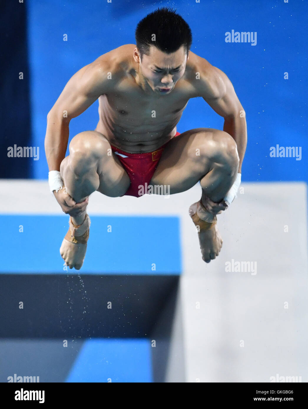 Rio de Janeiro, Brazil. 20th Aug, 2016. Gold medalist Chen Aisen of China in action during the Men's 10m Platform Final of the Diving event during the Rio 2016 Olympic Games at the Maria Lenk Aquatics Centre in Rio de Janeiro, Brazil, 20 August 2016. Photo: Felix Kaestle/dpa/Alamy Live News Stock Photo