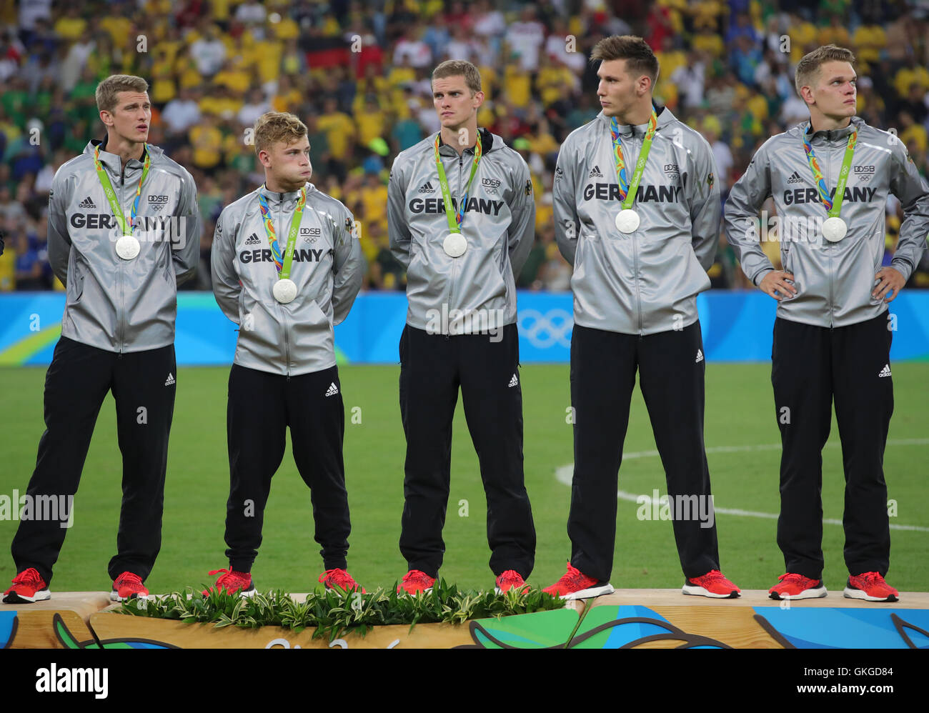 Rio de Janeiro, Brazil. 20th Aug, 2016. Silver medalist (L-R) Sven Bender, Maximilian Meyer, Lars Bender, Niklas Suele, Matthias Ginter of Germany reacts during the medal ceremony after losing the Men's soccer Gold Medal Match between Brazil and Germany during the Rio 2016 Olympic Games at the Maracana in Rio de Janeiro, Brazil, 20 August 2016. Photo: Friso Gentsch/dpa/Alamy Live News Stock Photo