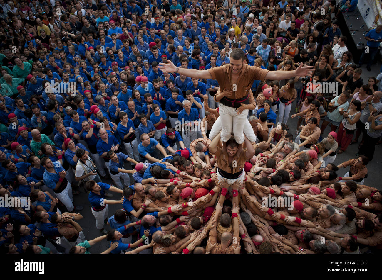 Barcelona, Catalonia, Spain. 20th Aug, 2016. Castellers (people who build human towers in Catalan) celebrate during Les Festes de Gracia. For the Gracia Quarter Summer Festival (Festes de Gracia) has been held the traditional Jornada Castellera (Human Towers Day) in the main square of the Catalan district. Credit:  Jordi Boixareu/ZUMA Wire/Alamy Live News Stock Photo