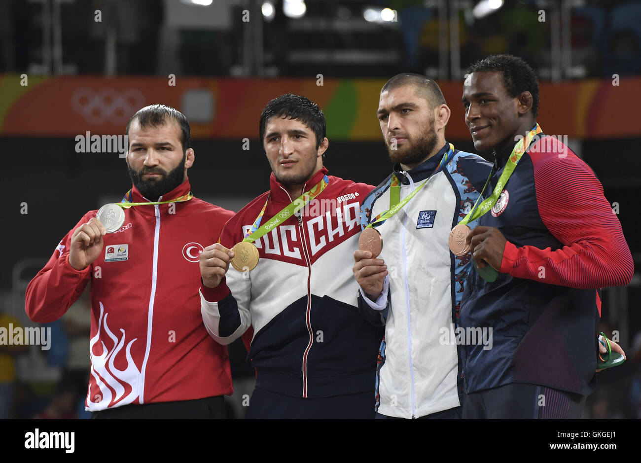 Rio De Janeiro, Brazil. 20th Aug, 2016. Gold medalist Russia's Abdulrashid Sadulaev (2nd, L), silver medalist Turkey's Selim Yasar (1st, L), bronze medalists Azerbaijan's Sharif Sharifov (2nd, R) and J'den Michael Tbory Cox of the United States of America attend the awarding ceremony for the men's freestyle 86kg final of Wrestling at the 2016 Rio Olympic Games in Rio de Janeiro, Brazil, on Aug. 20, 2016. Credit:  Wu Wei/Xinhua/Alamy Live News Stock Photo