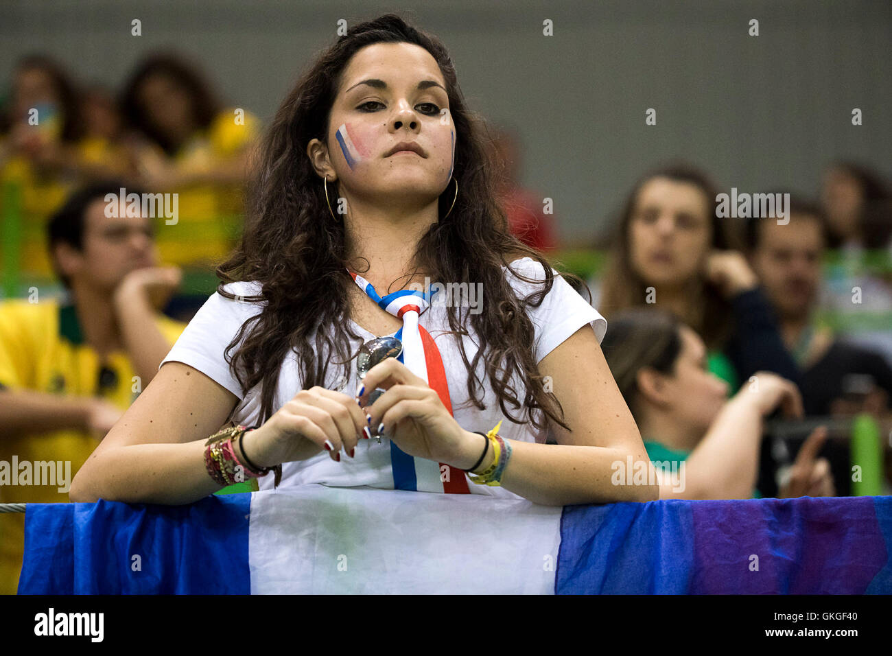Rio De Janerio, RJ, Brazil. 20th Aug, 2016. OLYMPICS HANDBALL: French fans watches team leave the court after losing to Russia in the Women's Handball Finals gold medal match at Future Arena during the 2016 Rio Summer Olympics games. Credit:  Paul Kitagaki Jr./ZUMA Wire/Alamy Live News Stock Photo