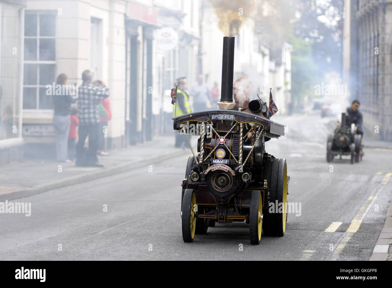 Kington, Herefordshire, UK. 21st August 2016.  A miniature steam engine makes its way up Kington High Street. Credit:  Andrew Compton/Alamy Live News Stock Photo