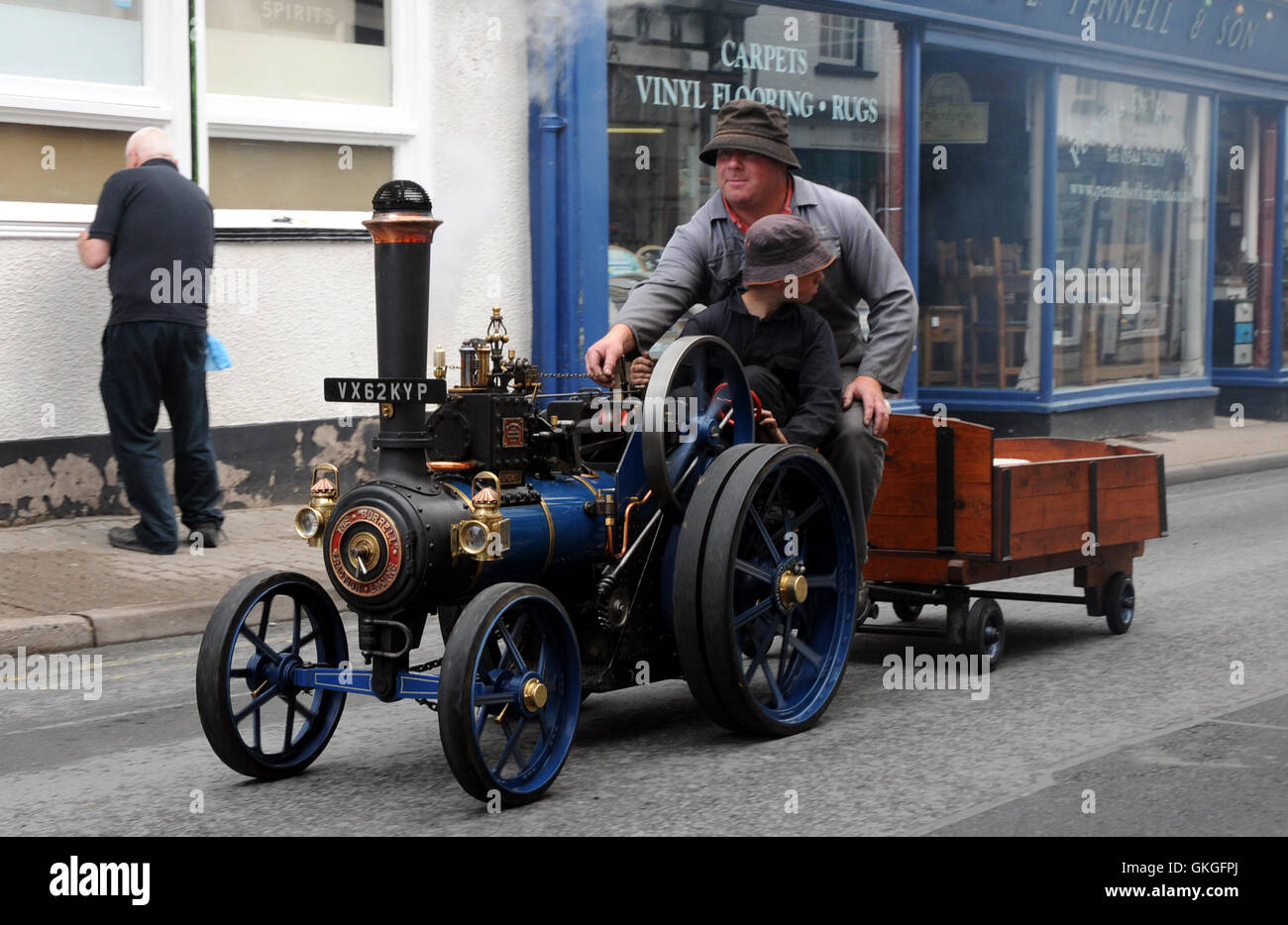 Kington, Herefordshire, UK. 21st August 2016.  A miniature steam engine makes its way up Kington High Street. Credit:  Andrew Compton/Alamy Live News Stock Photo