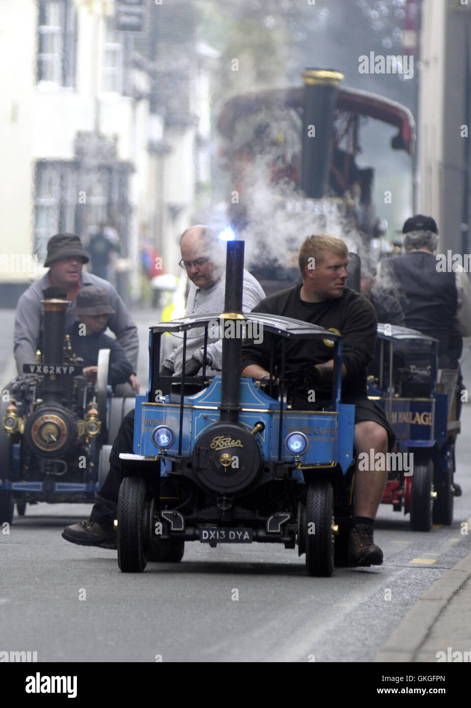 Kington, Herefordshire, UK. 21st August 2016.  Miniature steam engines make their way up Kington High Street. Credit:  Andrew Compton/Alamy Live News Stock Photo
