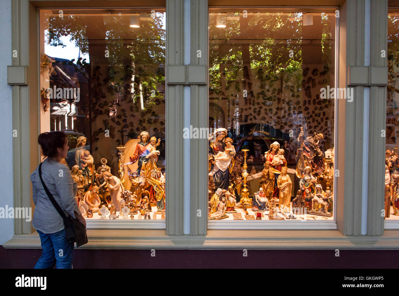 Germany, Kevelaer, shop with figures of saint, shop window. Stock Photo