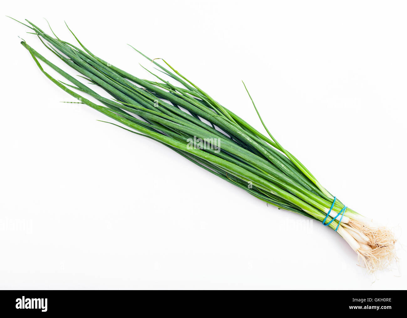 bunch of fresh cut green chives on white background Stock Photo Alamy