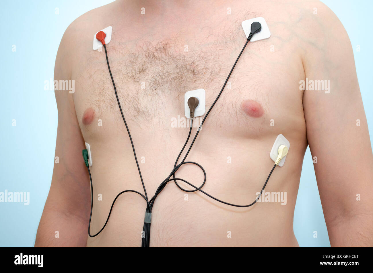 A man wearing holter monitor device Stock Photo