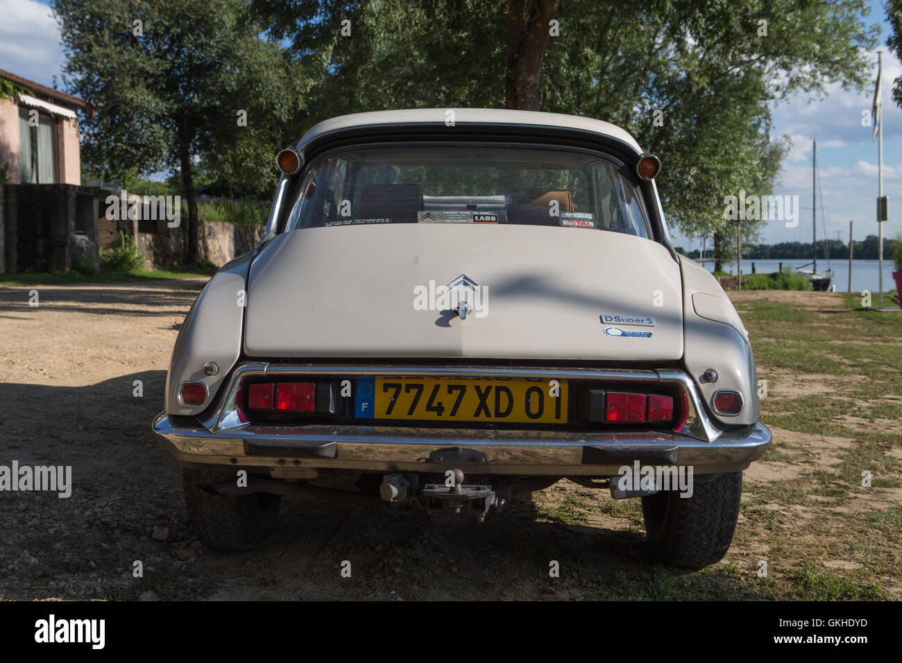 Vintage French car Citroen DS sitting alongside river Saone in France Stock Photo