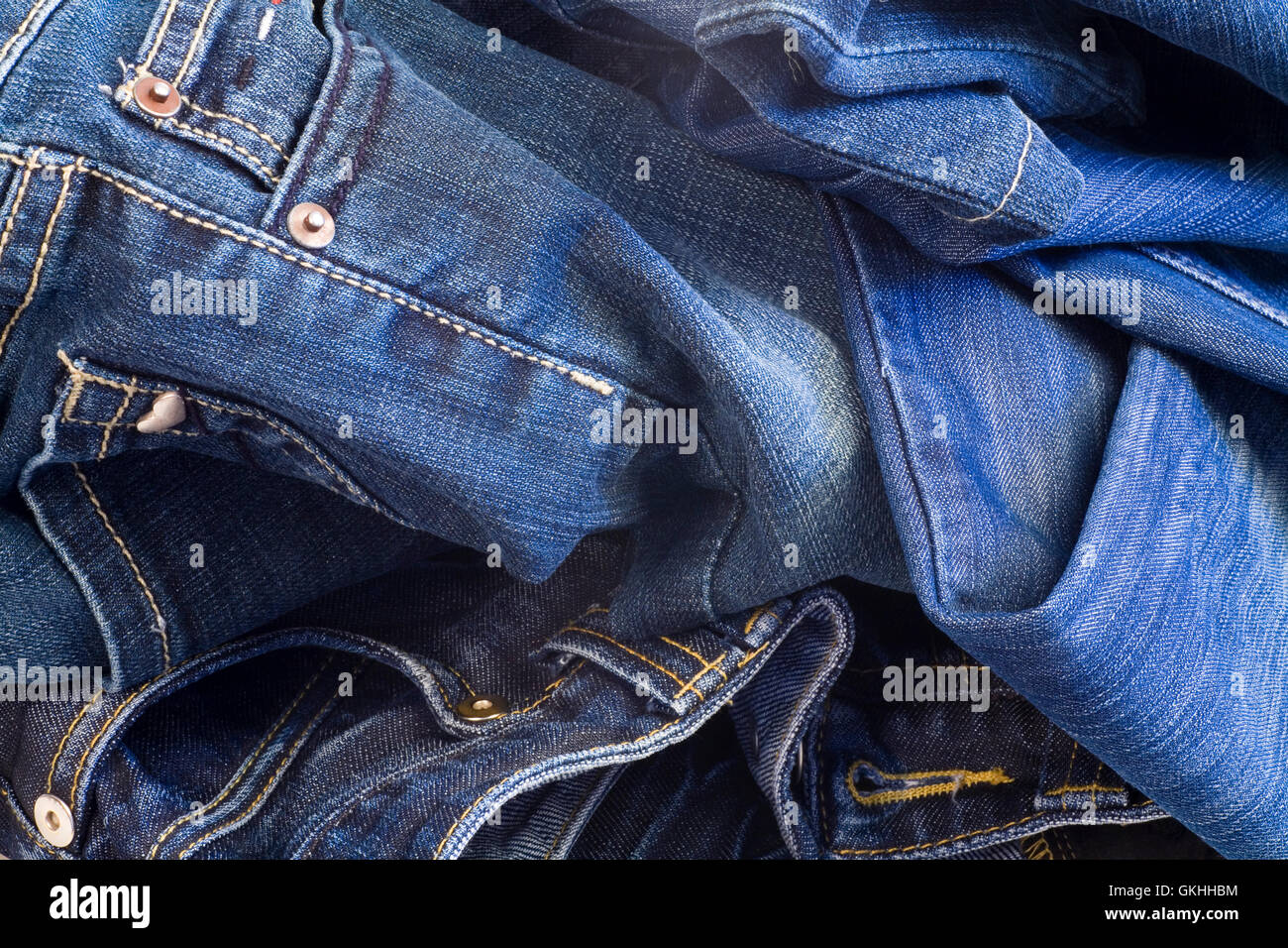folded new blue jeans Stock Photo - Alamy