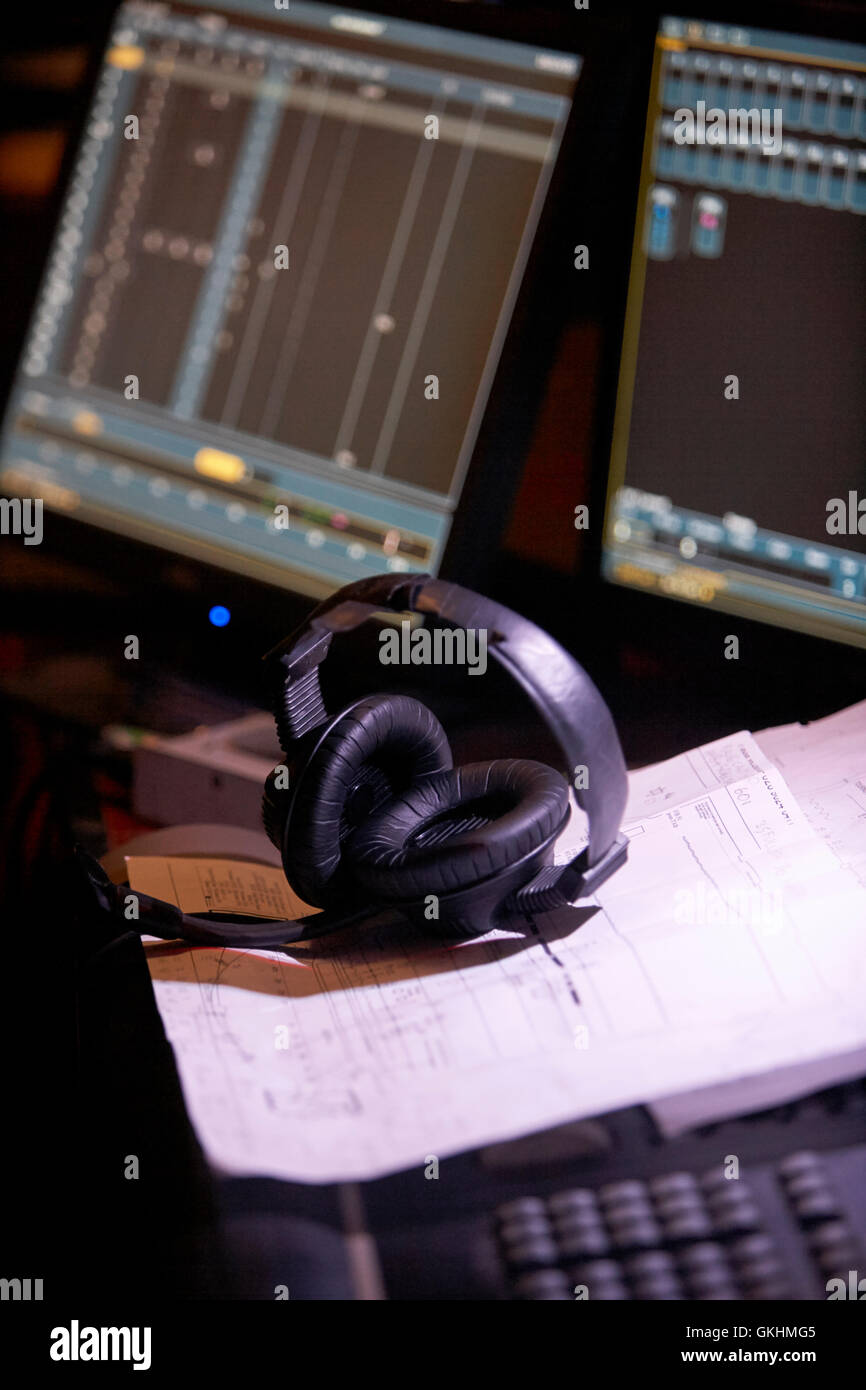 sound engineers headphones on mixing desk in a studio Stock Photo