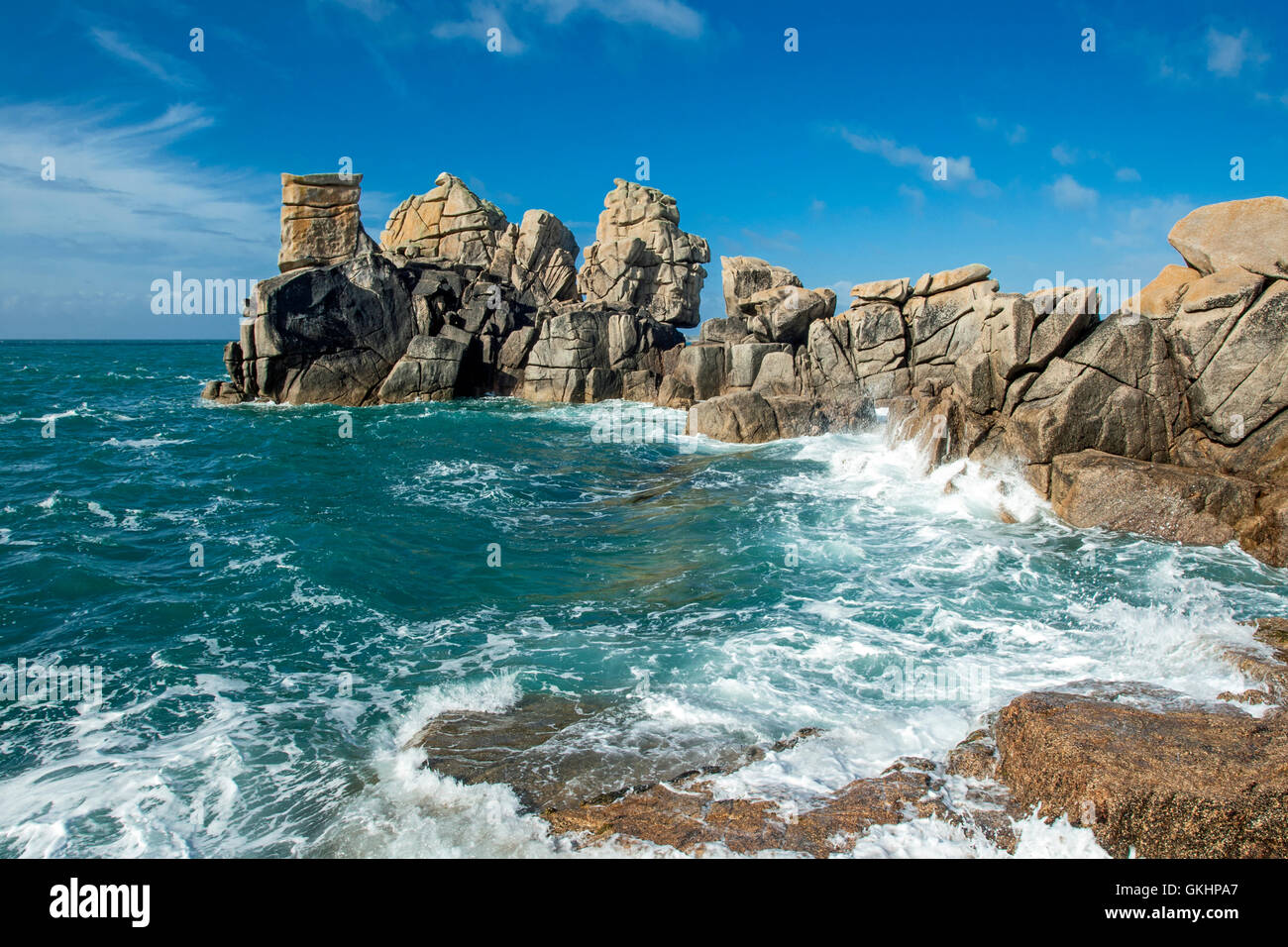 View of rocks and rough sea in morning light, Peninnis Head, St Mary's, Isles of Scilly, Cornwall, England Stock Photo