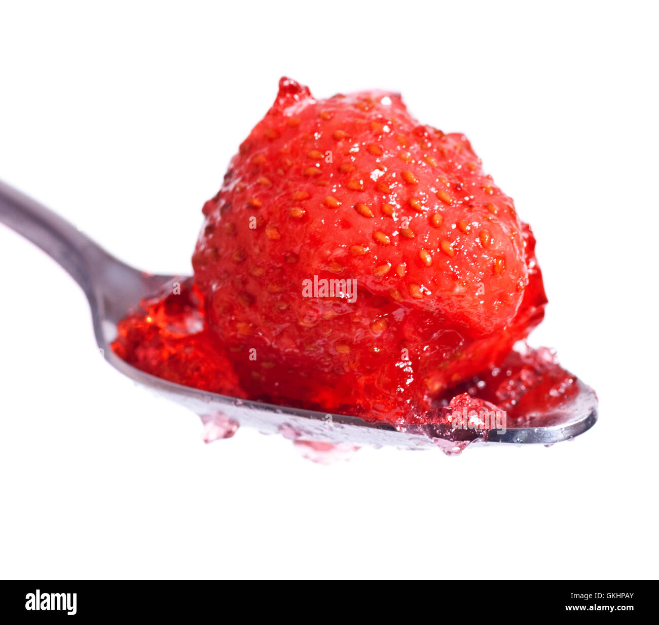 strawberry jelly on spoon Stock Photo Alamy