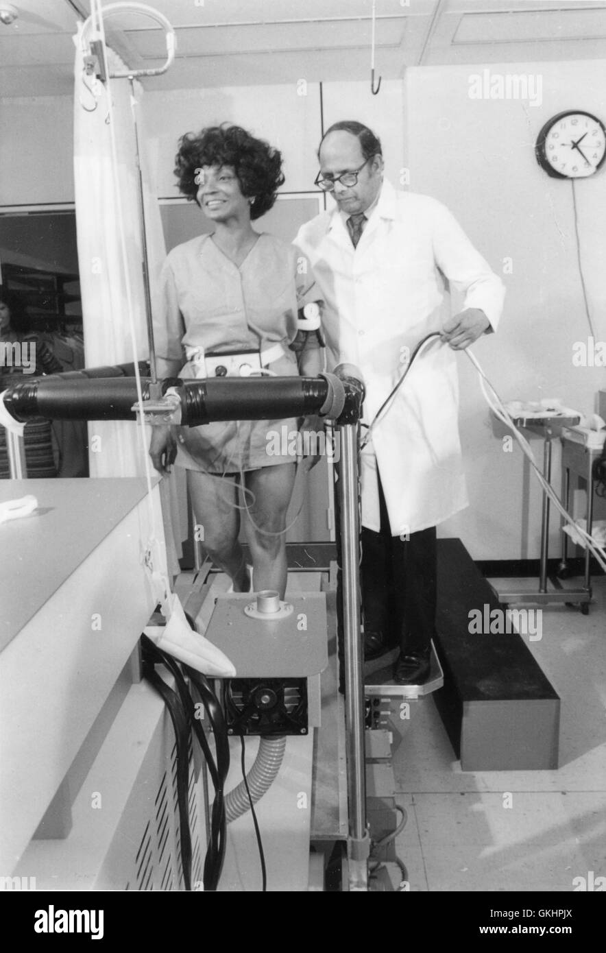 Nichelle Nichols, recently hired by the National Aeronautics and Space Administration to acquaint potential minority applicants throughout the United States with the opportunities available to them in the shuttle astronaut recruitment program. Here, she familiarized herself with the treadmill, one of the devices used in the pre-flight testing of the crews. Stock Photo