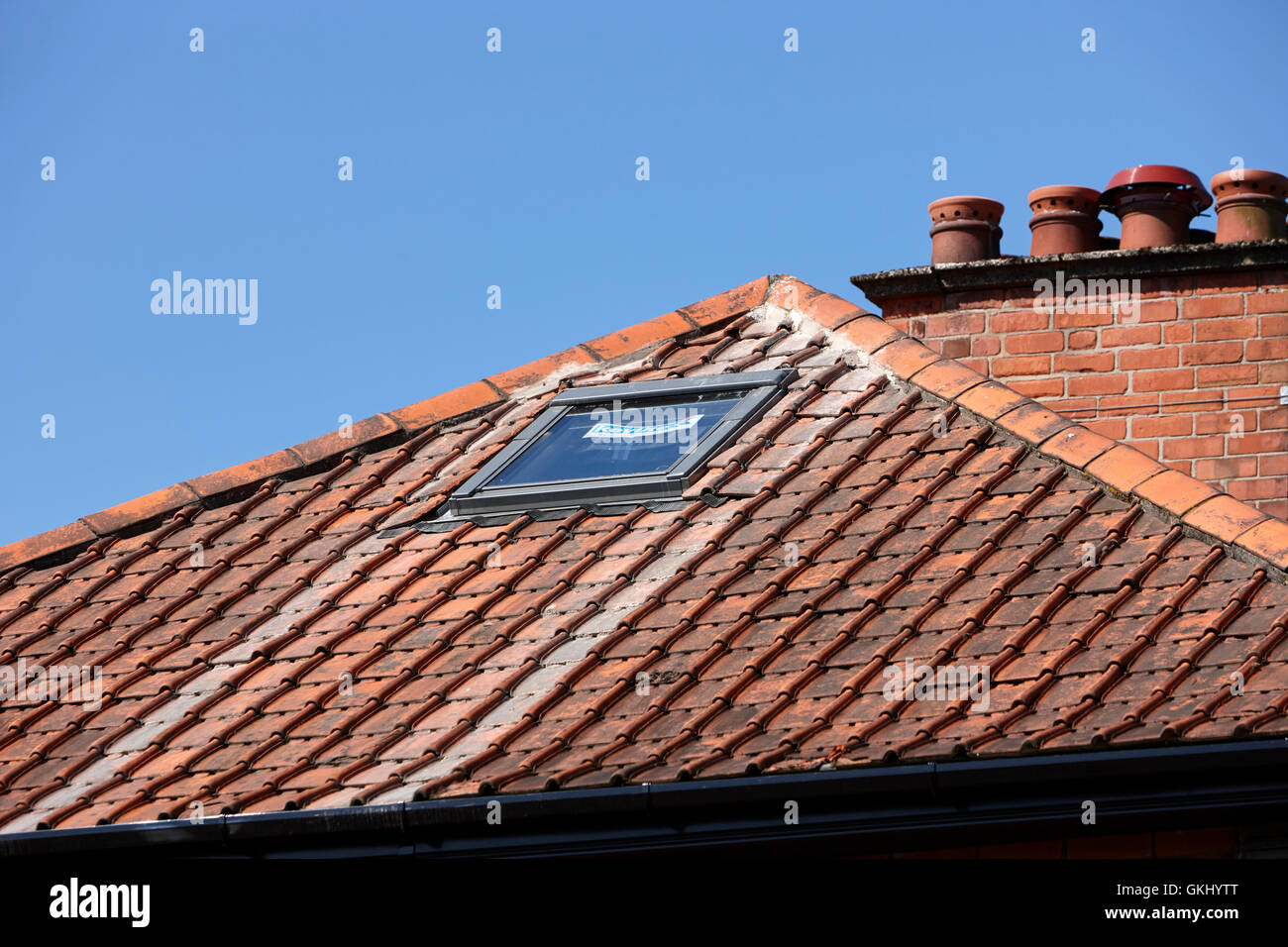 keylite roof window in a loft conversion of an older house Stock Photo