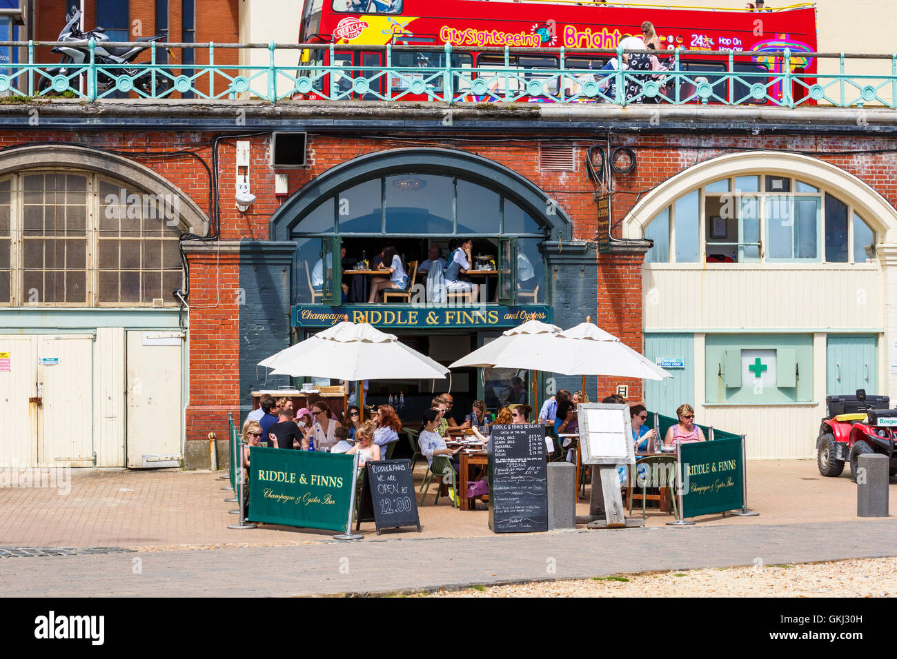 Riddle & Finns, a seafront Champagne and Oyster bar in Brighton, East Sussex, UK on a sunny day in summer Stock Photo