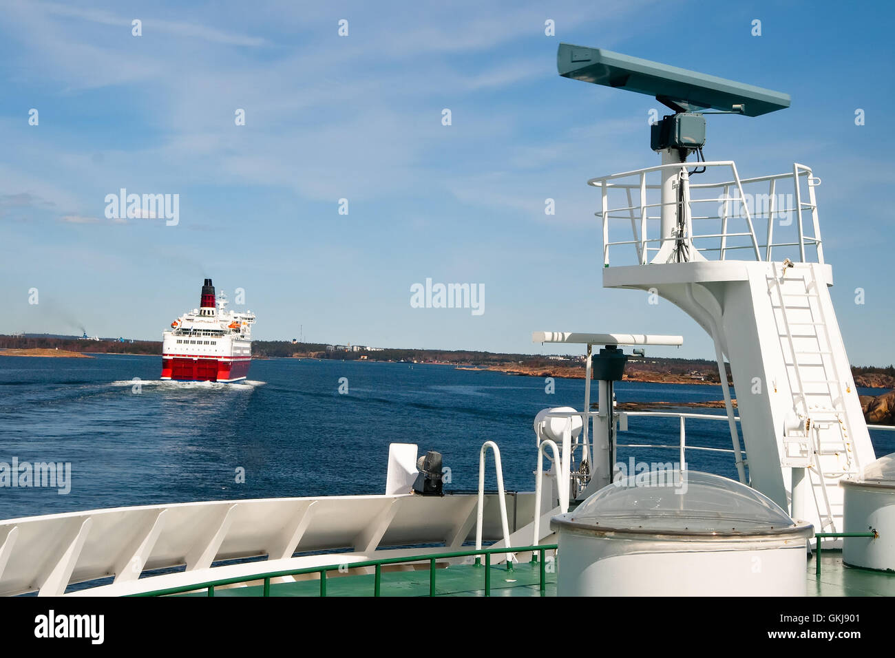Several large ferry and sail along the islands are close to the end point of travel Stock Photo