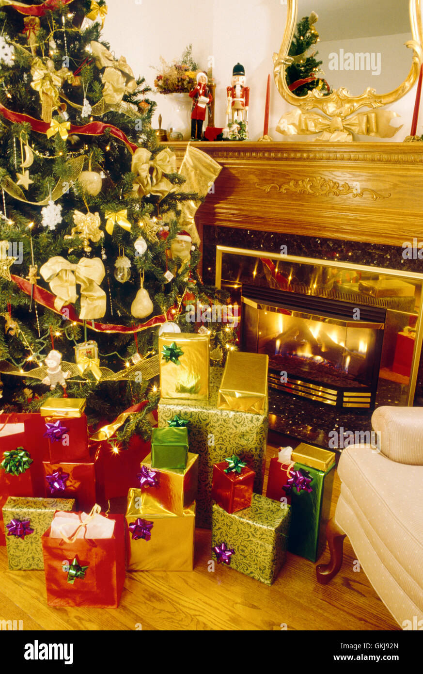 Christmas tree and fireplace Stock Photo