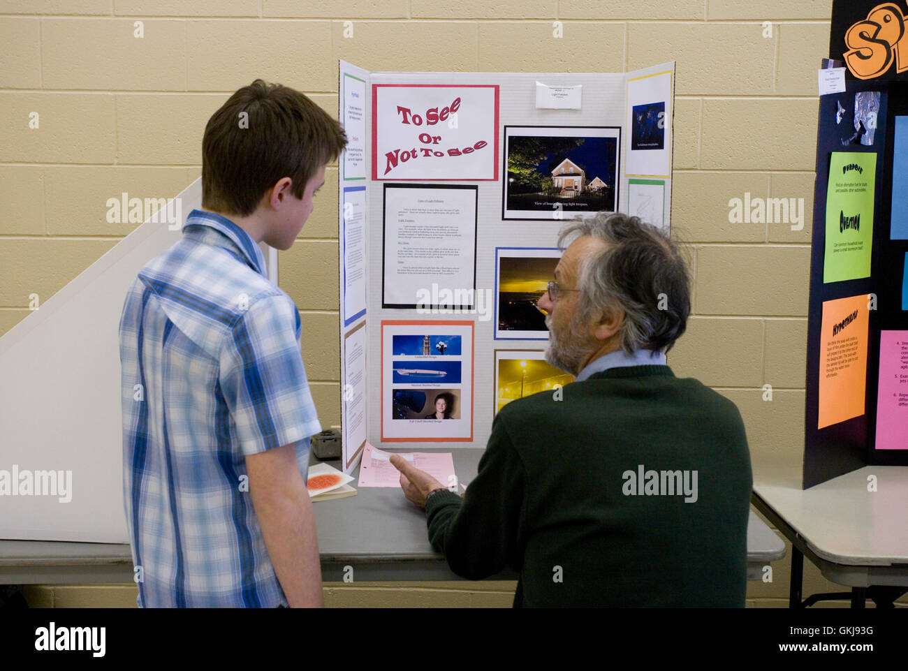 judging project at science fair Stock Photo