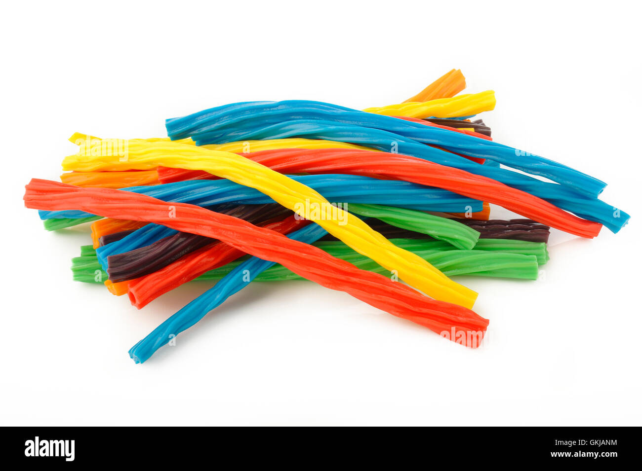 colorful licorice candy shaped like a twisted rope on white background Stock Photo Alamy