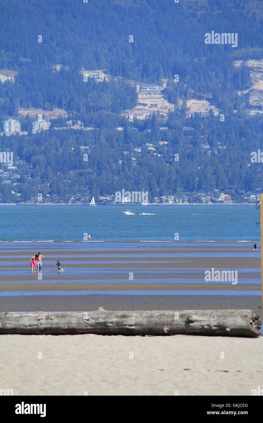 vancouver, beach, low tide, kids play, summer, sailing Stock Photo